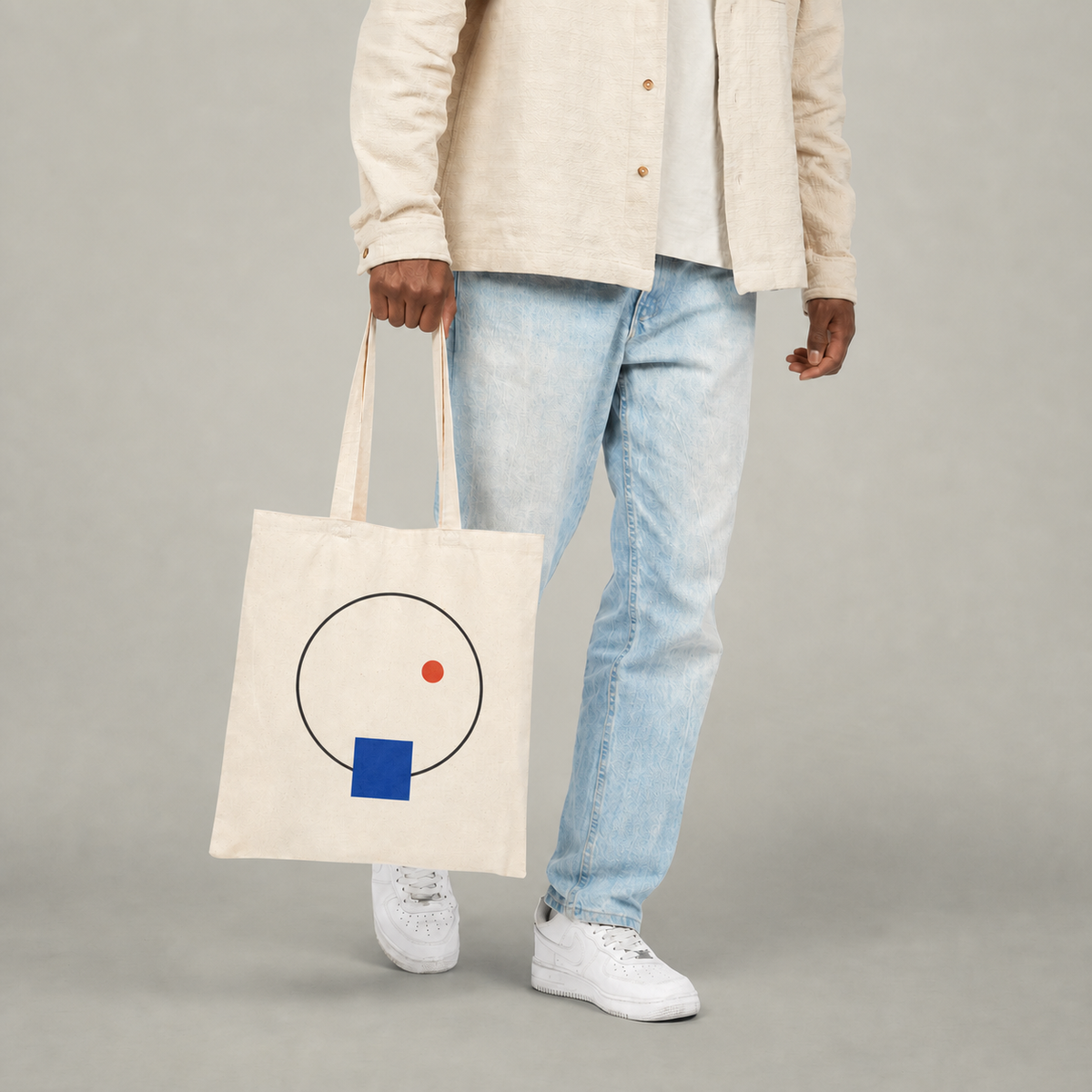 Quiet Orbit design on a natural canvas tote