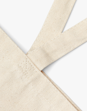 Close view of the heavy cotton canvas handles and stitching
